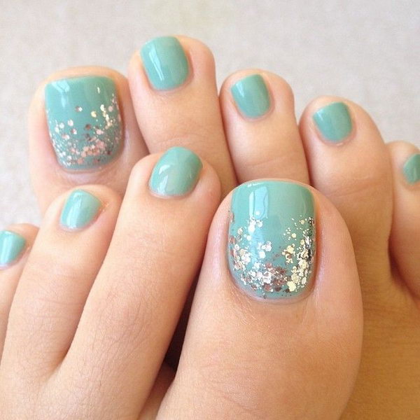 Simple Turquoise Base Toe Nails with Glitter. 