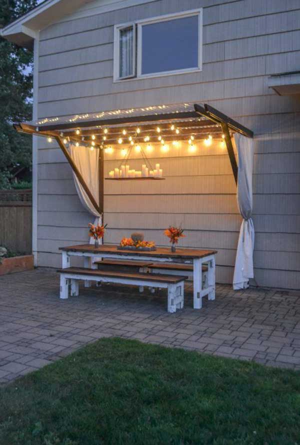 Build a super frugal pergola decorated with string lights. 